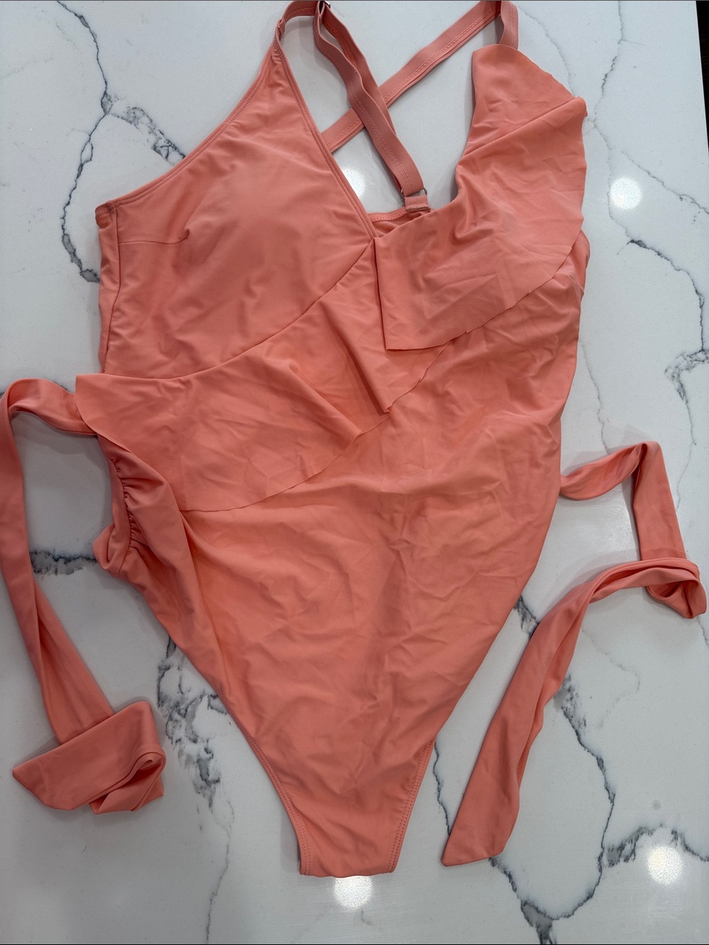 Ruffle-Accent Coral One-Piece Swimsuit with Tie Back